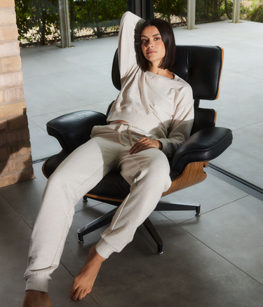 Woman wears Vanilla Marl Luxe Lounge Set