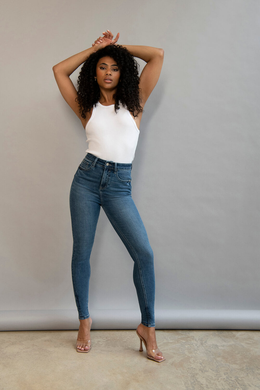 Mid blue sale high waisted jeans