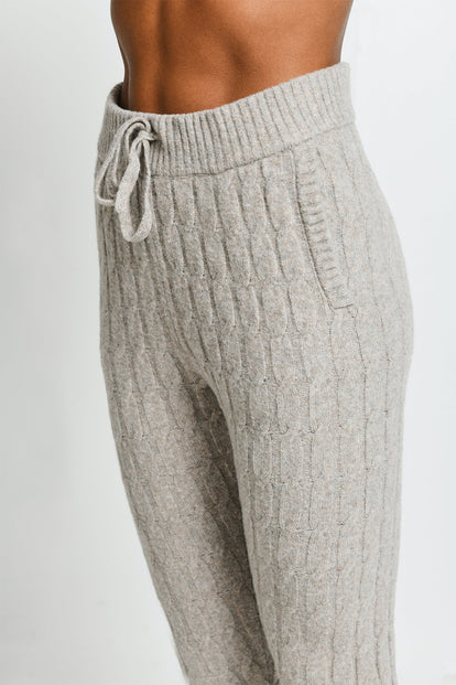 Beige wool joggers in loose-fitting knit